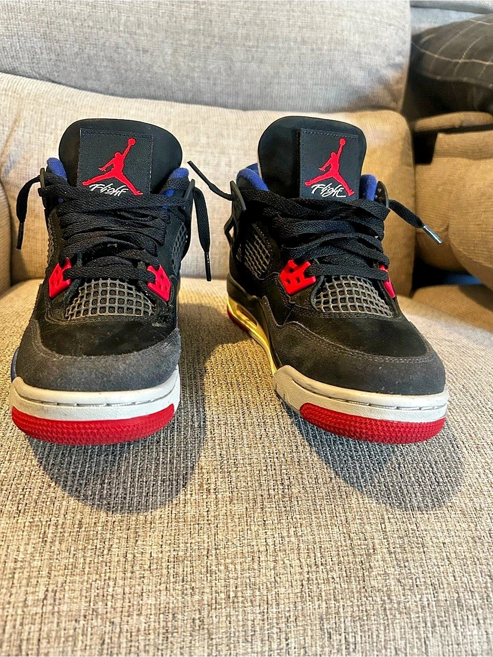 Nike Air Jordan 4 Black & Blue Sneakers